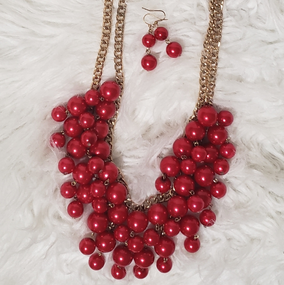Beautiful red necklace with earrings to match.